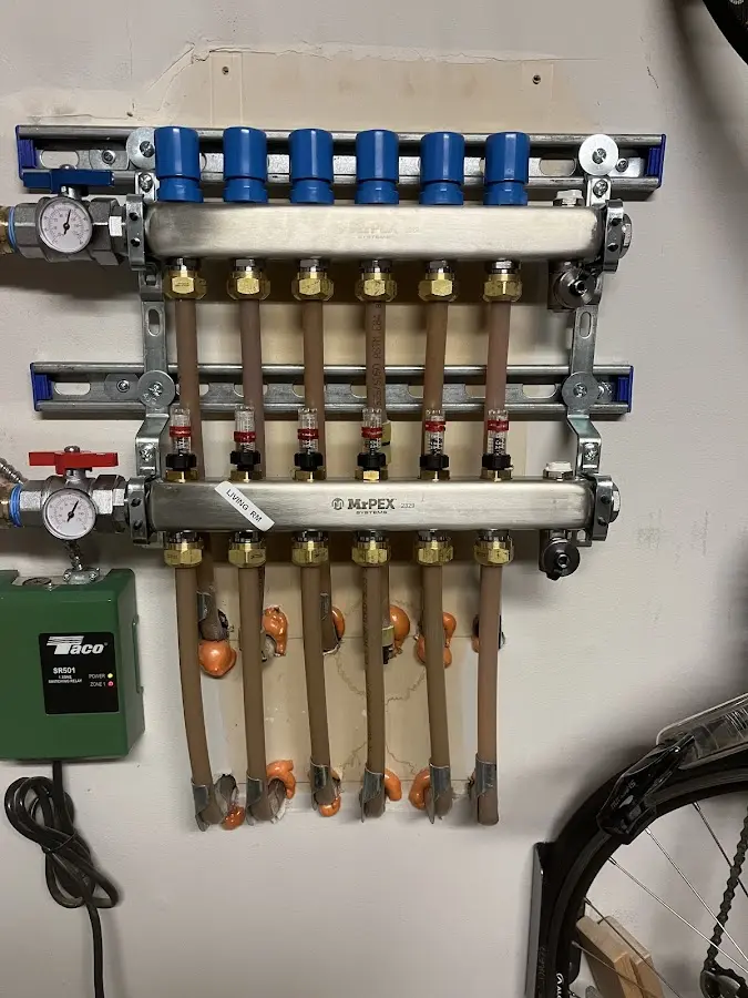 Plumber performing Gas Line Installation at a residential property in Mahomet